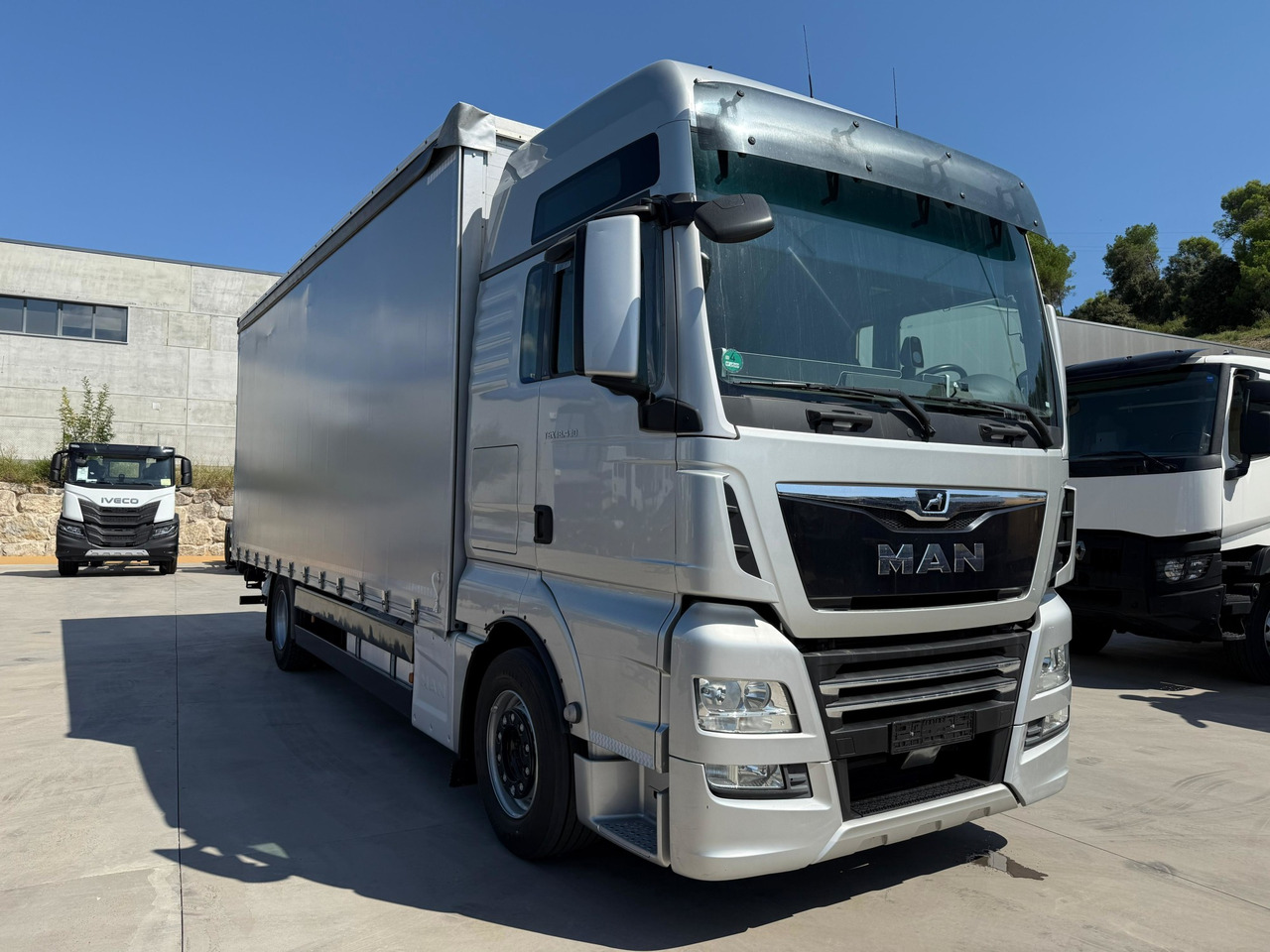 MAN 18.430 LL TGX E6 (Tauliner) - Tentinis sunkvežimis: foto 2 MAN 18.430 LL TGX E6 (Tauliner) - Tentinis sunkvežimis: foto 2