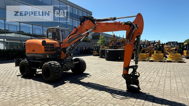 Wacker EW100 - Ratinis ekskavatorius: foto 1 Wacker EW100 - Ratinis ekskavatorius: foto 1