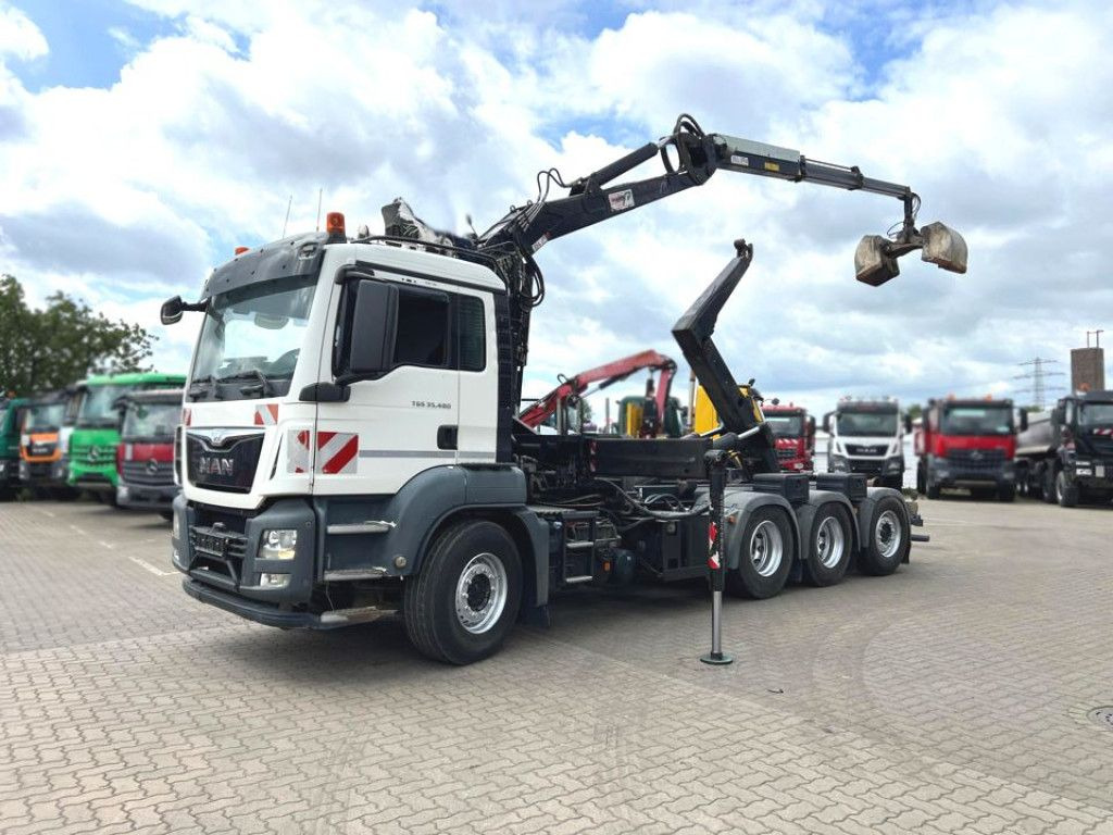 MAN TG-S 35.480 8x4 BL Abrollkipper mit Kran Penz-15 - Sunkvežimis su kranu: foto 1 MAN TG-S 35.480 8x4 BL Abrollkipper mit Kran Penz-15 - Sunkvežimis su kranu: foto 1